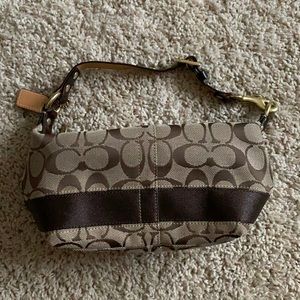Never been used, well kept, Coach mini bag.